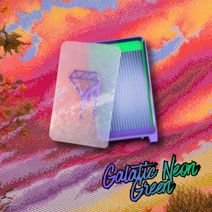 A rectangular tray with a translucent lid featuring a purple diamond graphic, shown on a colorful abstract background. The product is labeled 'Galactic Neon Green' in stylized text at the bottom right.