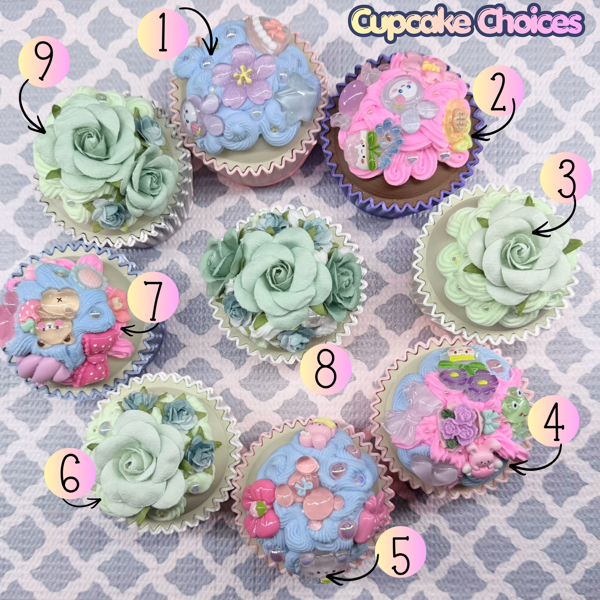 Decorative cupcakes with floral designs on a checkered background