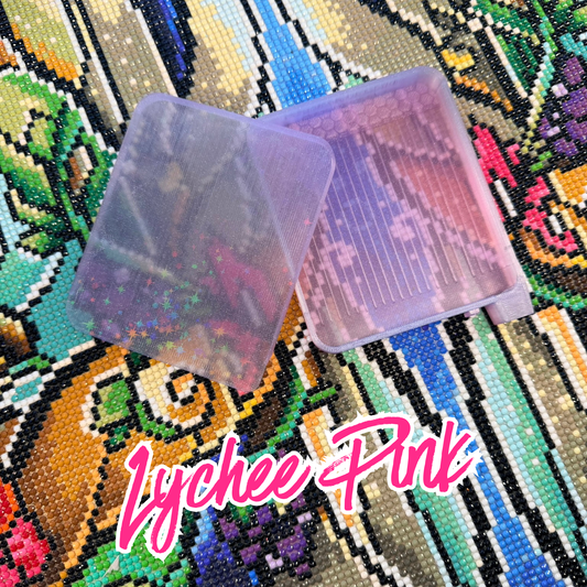 Translucent pink diamond art tray with lid on a colorful pixelated background with 'Lychee Pink' text.