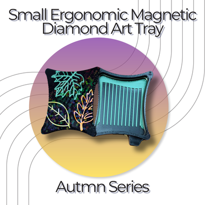 A small ergonomic magnetic diamond art tray from the Autumn Series,  embroidered leaf designs on lid magnetic base on a black tray with green lines.