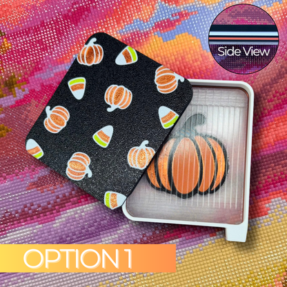Pumpkin Candy Corn Deluxe Diamond Art Tray, Option 1, featuring a translucent 3D printed drill tray with an orange pumpkin design beneath a black sliding lid decorated with pumpkins and candy corn. Includes a close-up side view showing the layered tray colors.