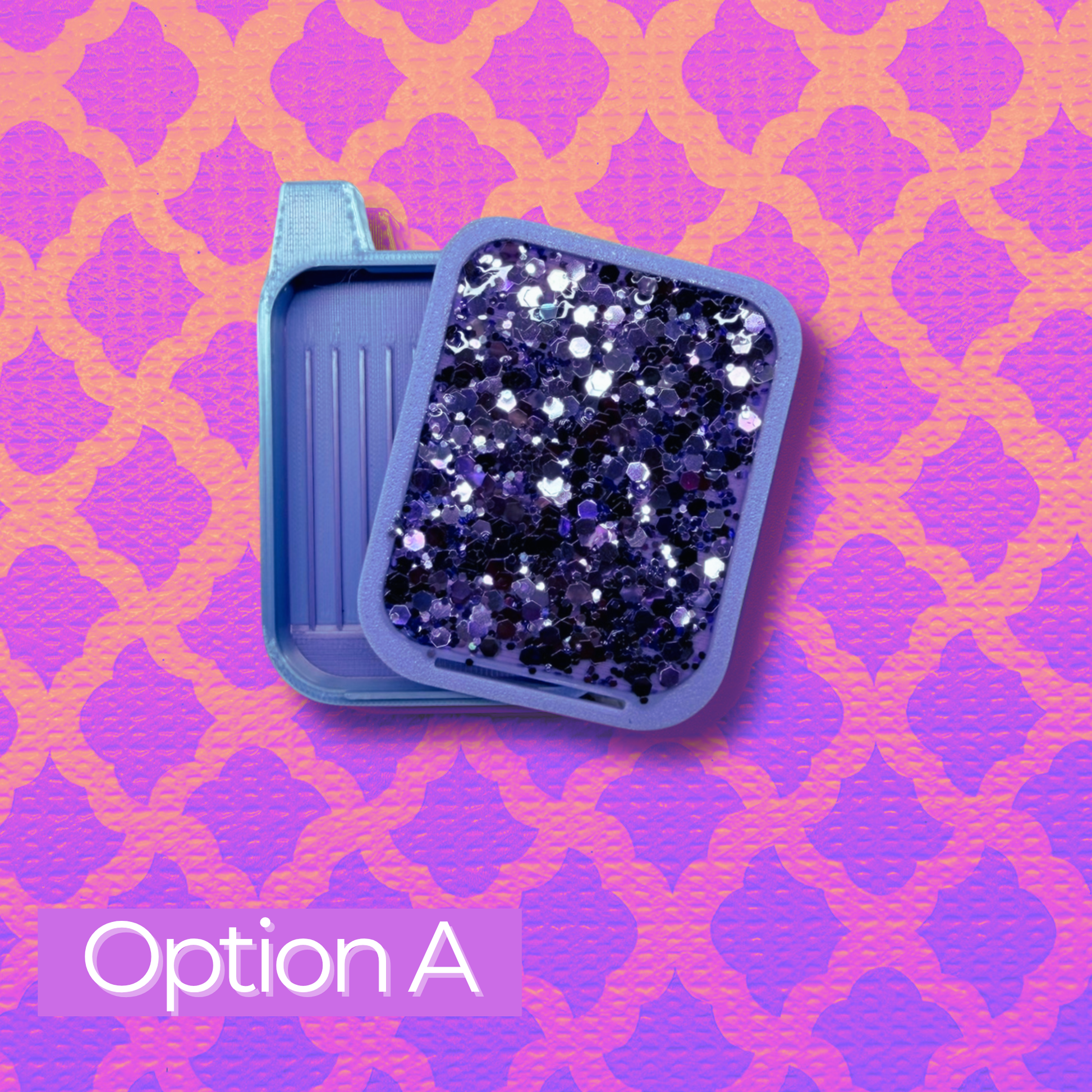 Blue container with purple glitter on a pink and orange patterned background