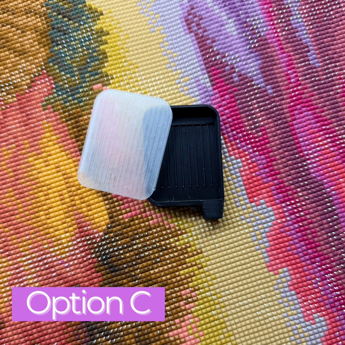 a small black tray with translucent lid- option c